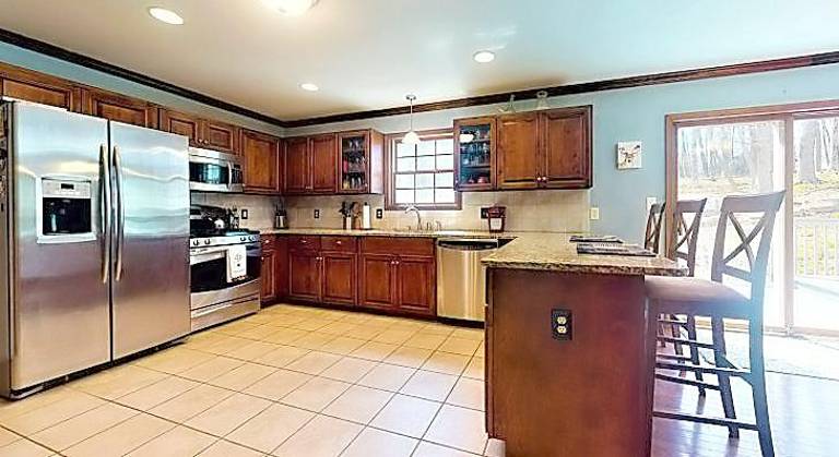 Modern two-story home has lake rights Kitchen