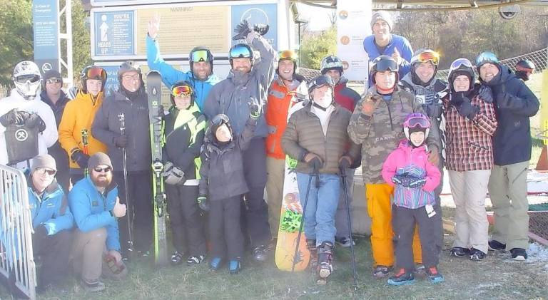 Die hard skiers and riders celebrate the earliest opining of the Mountain Creek Ski Resort in history.