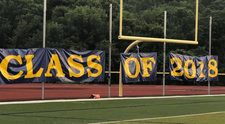 Vernon seniors graduate into future The class of 2018 banner is shown.