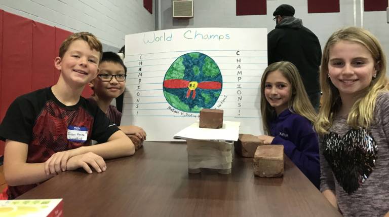 Team World Champions won the competition by creating a bridge that held 16 pounds.