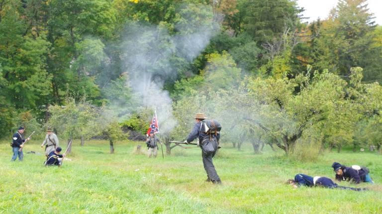 The Confederate troops are shown as they advance against the Union troops.