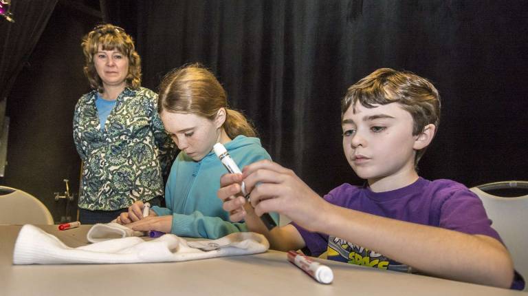 (L-R) Mom Meg Gummere of Vernon and her kids Emma, 12, and Patrick, 10.