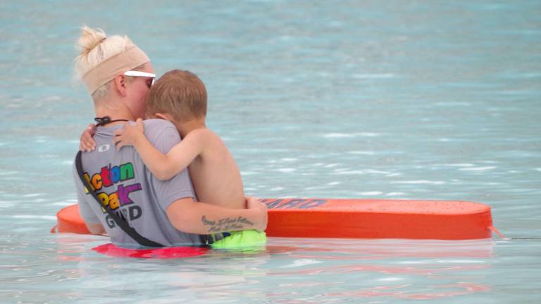 All through the lesson, little Marco Vincenti, 3, of West Milford insisted on enlisting the help of Certified Lifeguard Jessica Scioscia of Oak Ridge to keep him warm.