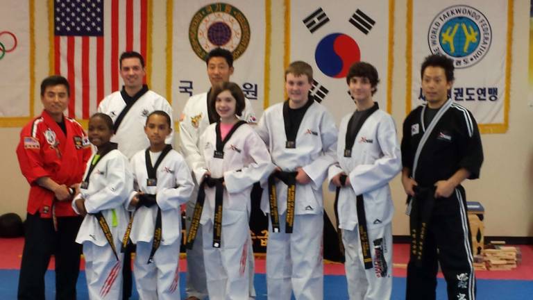 Master Ken's students earn black belts Master Ken's students earn black belts
