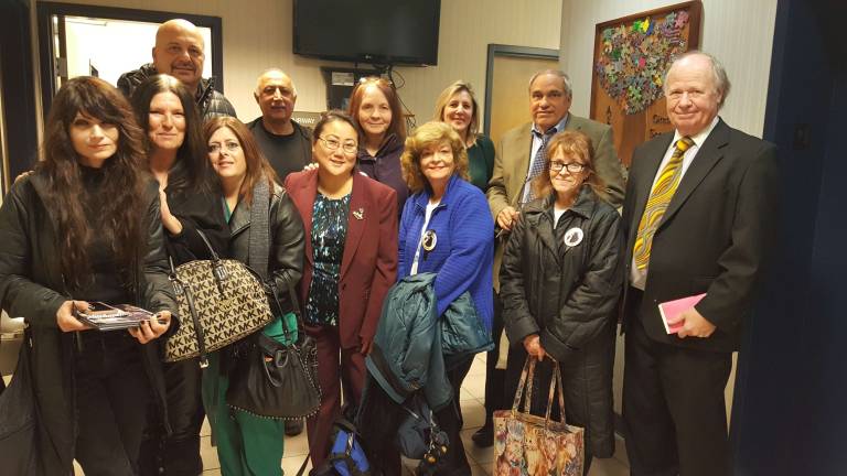 Local animal rights activist fined for part in bear hunt protest This was taken at court on Wednesday evening of the group. Cathy McCartney is far left.