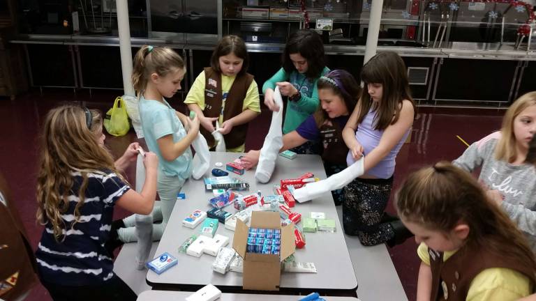 Girl Scouts collect hygiene items for needy