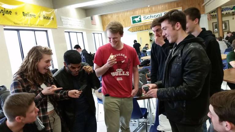 Tanner Sommese is pictured performing for some seniors during lunch at Sussex Vo-Tech.