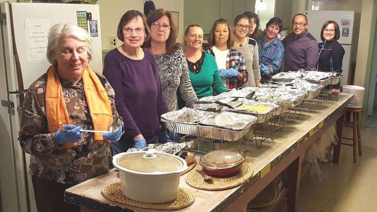 Vernon church hosts community dinner Vernon church hosts community dinner