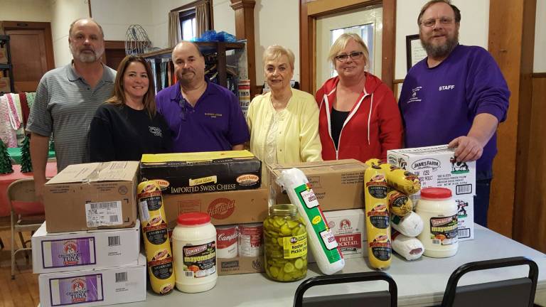 Sussex Elks use grant money to buy food for needy Sussex Elks use grant money to buy food for needy