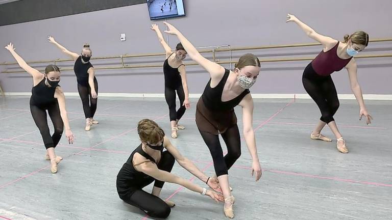 Kit Tamaki with Students of Dance Expression dance arts (from left): Alexa Gutt of Hardyston, Maya Sauer of Vernon, Meghan Mihalik of Lafayette, Ciara Brock of Vernon (student being corrected) and Sierra Trapanese of Sparta (Photo provided)