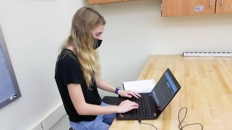 Sparta Robotics’ ‘Ring Leader’ team ranks 5th, heads to the States Shaelin Murphy coding (Photo provided)
