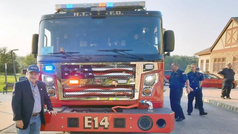 Hardyston Mayor Brian Kaminski in front of the new Rosenbauer fire engine (Photo by Laura Marchese)