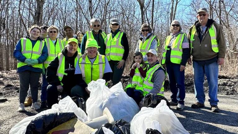 Volunteers filled 10 bags of recycled trash and eight bags of household trash during the cleanup.