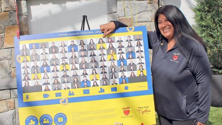 Denise Lewis of Sussex is featured on the Cheerios box (Photo provided)