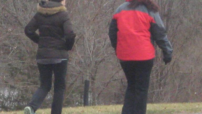 Joggers, walkers, dog owners come out before snow Joggers, walkers, dog owners come out before snow