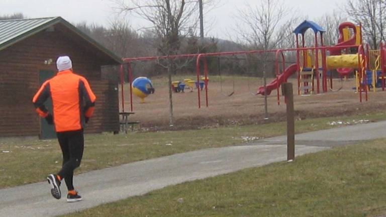Joggers, walkers, dog owners come out before snow Joggers, walkers, dog owners come out before snow