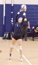 <b>Sussex Skylander's Kiarra Welsh stikes the ball.</b>