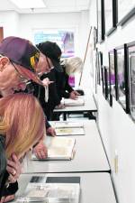 Residents look at displays in the new Sussex-Wantage Historical Society Museum in Sussex. (Photos by Maria Kovic)