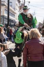 Steve Luoni of Highland Lakes gives parade-goers an opportunity to pet his horse Pavo during the St. Patrick’s Day Parade on March 18 in Newton. (Photos by John Hester)