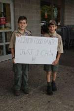 Boy Scout Yorgo Liaros is shown with Webelos Scout Matthew Catania are shown.