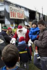 Santa arrives at the Sparta Train Station with Operation Toy Train in 2018.