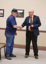 PHOTO BY MARK LICHTENWALNERThomas Gundlach of VFW post 8441 accepts the proclamation issued by the Vernon Town Council to mark the upcoming Veterans day holiday.