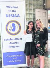<b>Senior Uriah Sacdalan was Vernon’s representative at the annual NJSIAA Scholar Athlete Luncheon held at the Pines Manor in Edison this past Sunday (May 17). Uriah is currently second in the class and participates in the Girls’ Wrestling and Golf Teams. Pictured with Uriah is head wrestling coach Ashley Gocklin.</b>