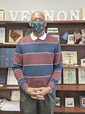 Vernon Mayor Howard Burrell protects others by wearing his V for Vernon mask