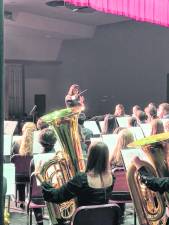 <b>Dr. Deb Gianuzzi conducts the High School Band </b>