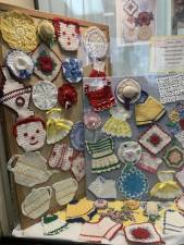 Hot mats, pot holders on display at library