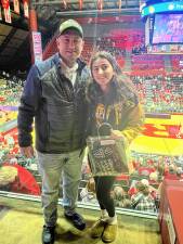 <b>Senior Abigail Mundhenk represents Vernon Township High School at the New Jersey State Interscholastic Athletic Association (NJSIAA) annual National Girls &amp; Women in Sports Day at Rutgers University. With her is field hockey coach Kieran Killeen. (Photo provided)</b>