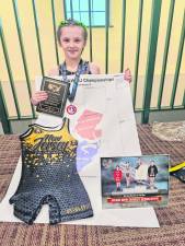 Kyra Bradley takes first place in her weight class in the 2024 New Jersey Scholastic State Championships in Trenton. (Photos provided)