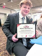 <b>Vernon linebacker Gavin Wilczewski is shown with his award.</b>
