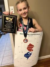 Reese Baumann of Vernon was named state champion in the 14U 79-pound weight class at a wrestling tournament March 11 in Trenton. Reese, who has been wrestling for two years, won first place by pinning her opponents in three matches. (Photos provided)