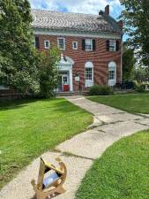 A sunspotter telescope sits outside the Dennis Library in Newton. (Photo provided)