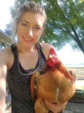 Danielle Montuori with one of her chickens. She bought quails on impulse at the start of the lockdown but decided to to downsize before winter. “The chickens are enough to deal with,” she said. (Photo by Jason Wood)
