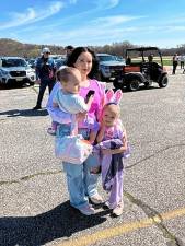 <b>EBS1 Kylie Martin of Newton and her daughters River and Raighn wait for the Easter Bunny’s descent during the annual Easter Egg Hunt &amp; Easter Bunny Skydiving Extravaganza on Friday, April 18 at the Sussex Airport in Wantage. (Photo by Janet Redyke)</b>