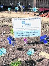 <b>The Vernon Township Woman's Club sponsored the April Pinwheel Project declaring that all children deserve a safe and happy childhood.</b>