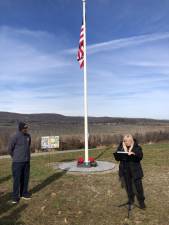 Mayor Howard Burrell and Sally Rinker take part in a memorial dedication at the Vernon Pump Track on Nov. 25.