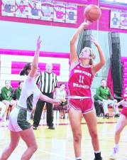 <b>High Point's Daphne Mathews (11) is in the midst of a shot. Mathews scored 2 points.</b>