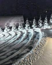 <b>This photo submitted by reader Maro Kasparian of Vernon Township shows curved piles left by the snow plow during a recent storm.</b>