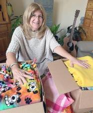 The Vernon Township Woman’s Club makes fleece blankets for patients like Lexxi, to provide a source of comfort before and after surgery (Photo provided)