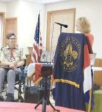 Vernon Township Historical Society member and retired Vernon teacher Nancy Grimaldi presents Eagle Scout Joseph Dunlop with an award at his Court of Honor.