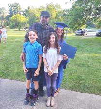 Denise Clarke with her husband Richard, son George and daughter Mikayla.