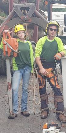 Caption Kat Werner and Dan Pirl on the job (Photo courtesy of Blue Ridge Tree Service)
