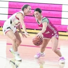 <b>High Point's Grace Elston dribbles the ball. Elston scored 5 points.</b>