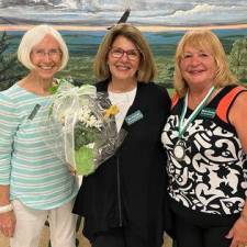 The Vernon Township Woman’s Club has placed MJ Palmer on its Honor Roll for her work in coordinating the group’s involvement with the Warwick Area Farmworker Organization and the Emmanuel Cancer Foundation. From left are membership chairwoman Joan Danaher, Palmer and club president Maria Dorsey. (Photo provided)
