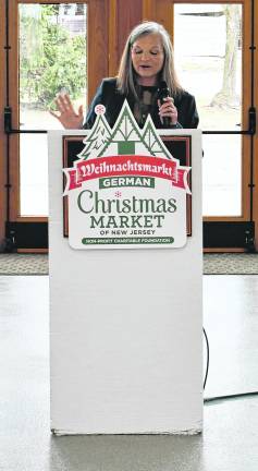 <b>Sabine Watson, president of German Christmas Market of N.J. gives a speech.</b>