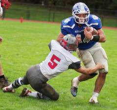 Kittatinny running back Jacob Mafaro carries the ball as he crashes into High Point defender Noah Cruz in the first half.