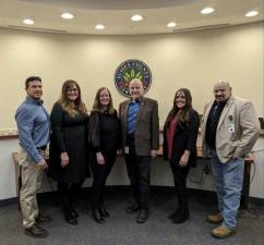 Jennifer Shortino, third from left, poses with county commissioners, from left, Chris Carney, Jill Space, Herbert Yardley, Dawn Fantasia and William Hayden. (Photo provided)
